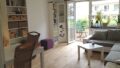 Wohnzimmer mit Balkon